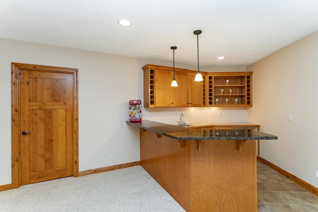 1315 Wicklow Ln SW, Rochester, MN 55902 - indoor wet bar with baseboards, hanging light fixtures, and recessed lighting