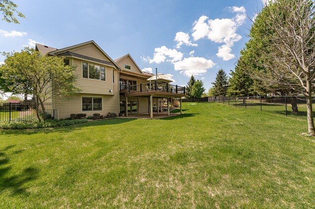 1315 Wicklow Ln SW, Rochester, MN 55902 - back of property with a wooden deck, a patio, and stairs