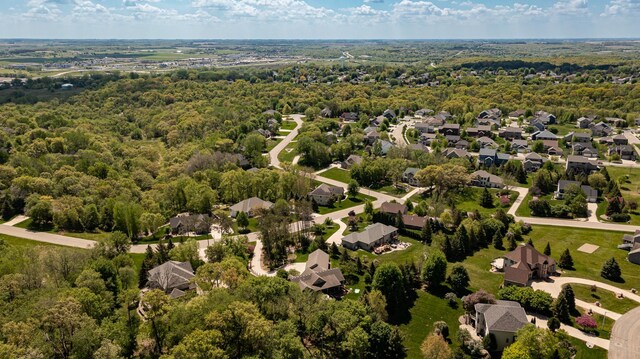 1315 Wicklow Ln SW, Rochester, MN 55902 - aerial perspective of suburban area with a forest