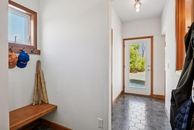 mudroom featuring baseboards