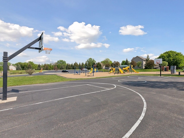 view of sport court featuring community basketball court and playground community