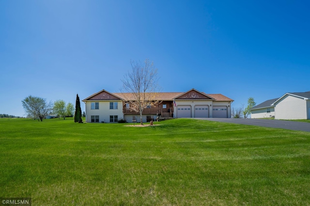 1603 86th Ave, Hammond Twp, WI 54015 - view of front of home featuring an attached garage, a front yard, and driveway