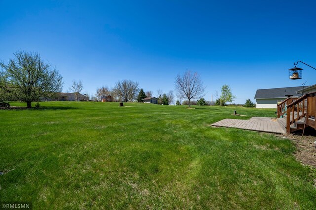 1603 86th Ave, Hammond Twp, WI 54015 - view of grassy yard with a deck