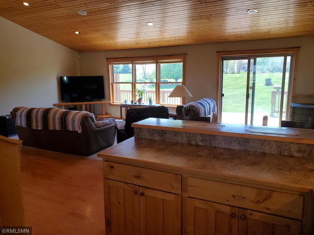 1603 86th Ave, Hammond Twp, WI 54015 - kitchen featuring wooden ceiling, recessed lighting, wood finished floors, light countertops, and open floor plan