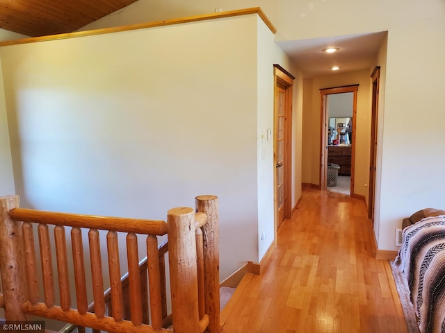 1603 86th Ave, Hammond Twp, WI 54015 - hall featuring light wood-style flooring, baseboards, an upstairs landing, vaulted ceiling, and recessed lighting