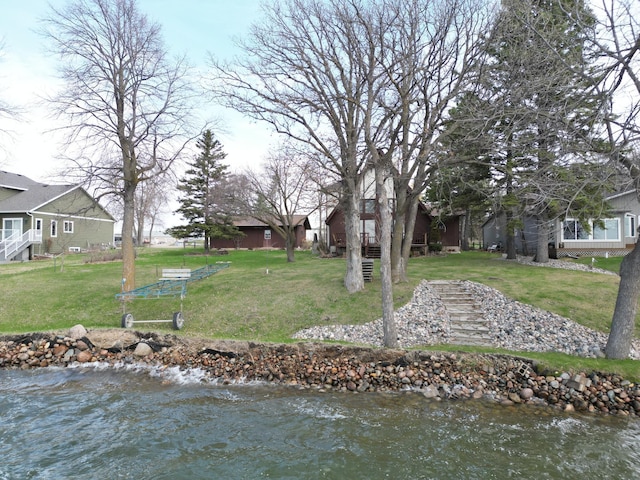 exterior space with a water view