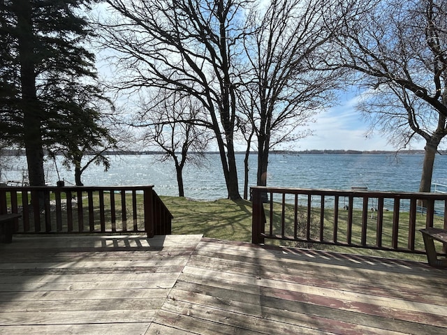 wooden terrace with a water view