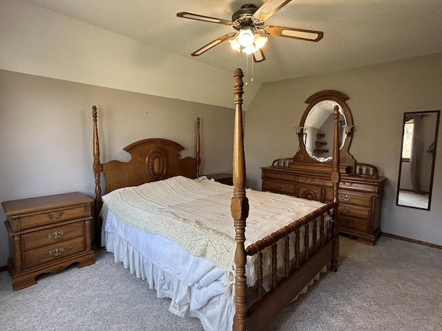 bedroom featuring ceiling fan and light carpet