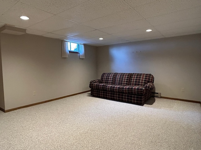 sitting room with carpet floors, recessed lighting, baseboards, and a drop ceiling