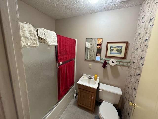 27530 Steel Bridge Rd NE, Waskish, MN 56685 - full bathroom with toilet, a textured ceiling, a shower with shower door, and vanity