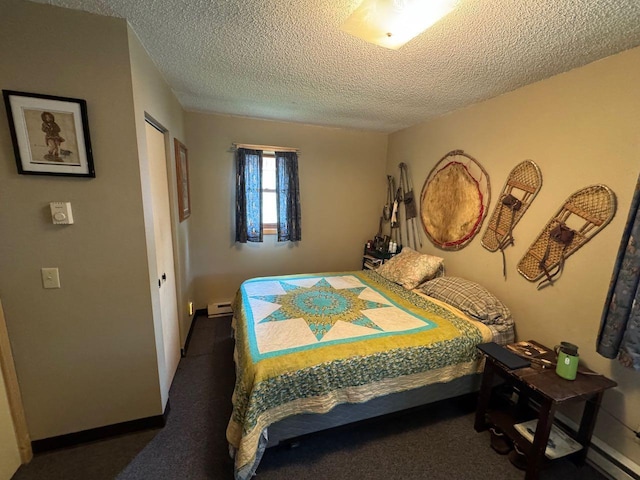 27530 Steel Bridge Rd NE, Waskish, MN 56685 - carpeted bedroom with a baseboard radiator and a textured ceiling