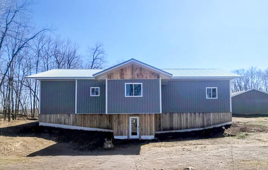 exterior space featuring metal roof