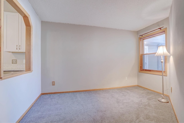 1870 Southpointe Ter Unit W1870, Eagan, MN 55122 - carpeted spare room with a textured ceiling and baseboards