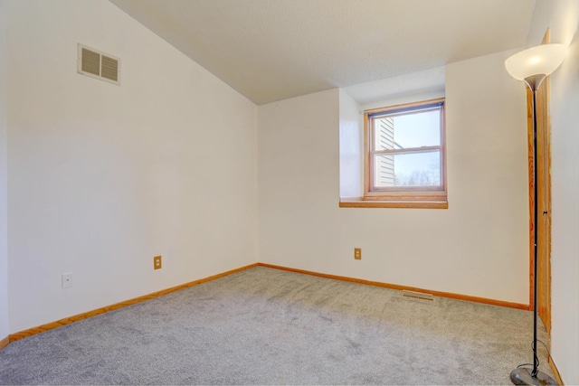 1870 Southpointe Ter Unit W1870, Eagan, MN 55122 - carpeted empty room featuring baseboards, lofted ceiling, and visible vents