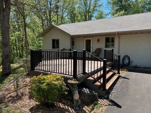 32305 W St, Breezy Point, MN 56472 - view of front facade featuring roof with shingles