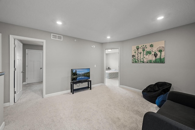1144 Middlefield Rd, Medina, MN 55340 - sitting room with carpet floors, recessed lighting, and baseboards