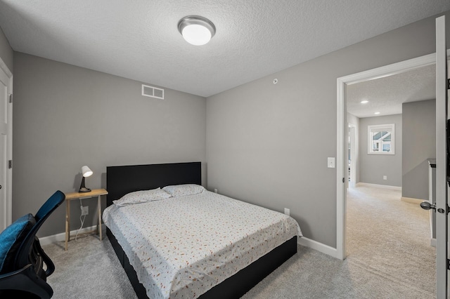 1144 Middlefield Rd, Medina, MN 55340 - bedroom featuring light carpet, a textured ceiling, baseboards, and recessed lighting