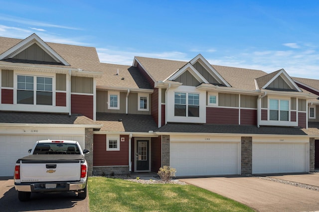 1144 Middlefield Rd, Medina, MN 55340 - townhome / multi-family property featuring board and batten siding, stone siding, concrete driveway, and a garage