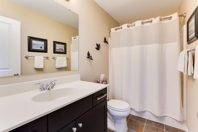 6942 151st St, Savage, MN 55378 - full bathroom with vanity, toilet, shower / bath combination with curtain, and stone finish flooring