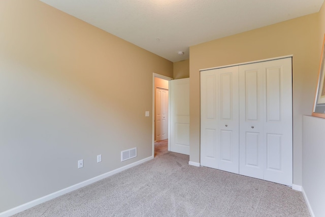 6942 151st St, Savage, MN 55378 - unfurnished bedroom featuring carpet floors, baseboards, and a closet