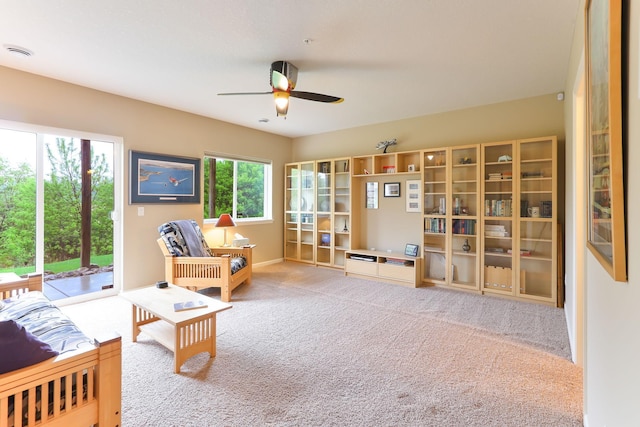 6942 151st St, Savage, MN 55378 - living area with carpet floors, ceiling fan, and baseboards