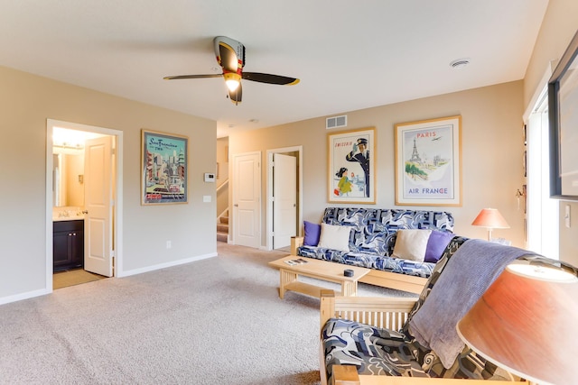 6942 151st St, Savage, MN 55378 - carpeted living room featuring a ceiling fan, stairs, and baseboards
