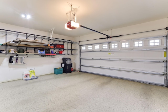 6942 151st St, Savage, MN 55378 - garage featuring a garage door opener