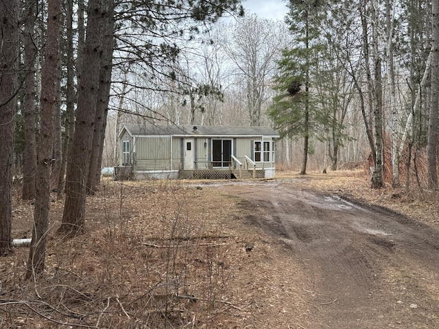 manufactured / mobile home with roof with shingles
