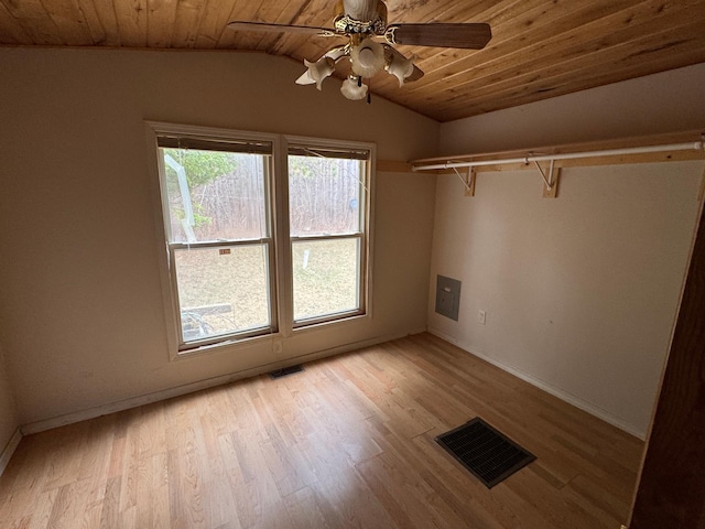 spare room with visible vents, wooden ceiling, and lofted ceiling