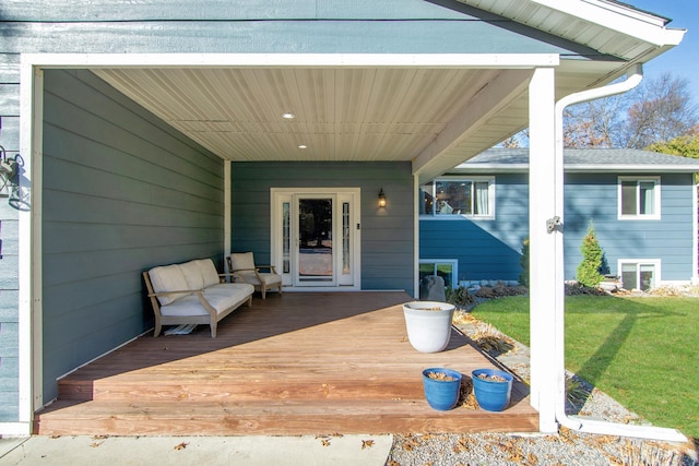 5360 Marohn Rd, Baxter, MN 56425 - view of exterior entry featuring a wooden deck and a yard