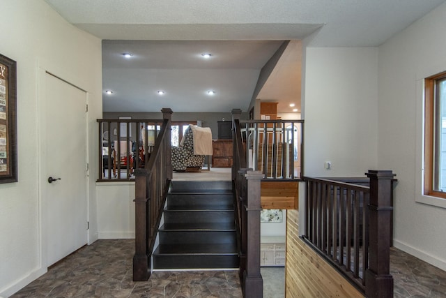 5360 Marohn Rd, Baxter, MN 56425 - stairway with baseboards and stone finish floor