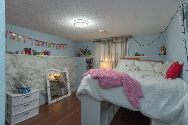 5360 Marohn Rd, Baxter, MN 56425 - bedroom featuring a textured ceiling and wood finished floors