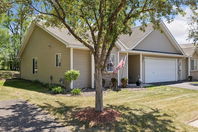 11521 Poppy St NW, Coon Rapids, MN 55433 - view of front facade with an attached garage, a front yard, asphalt driveway, and a shingled roof