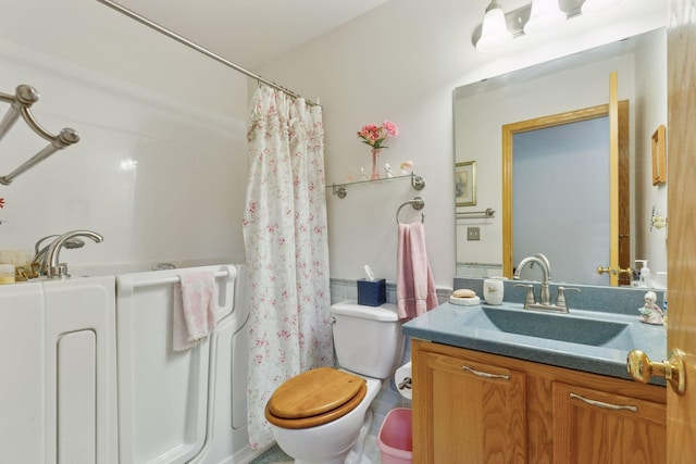 11521 Poppy St NW, Coon Rapids, MN 55433 - full bathroom with toilet, vanity, and a shower with shower curtain