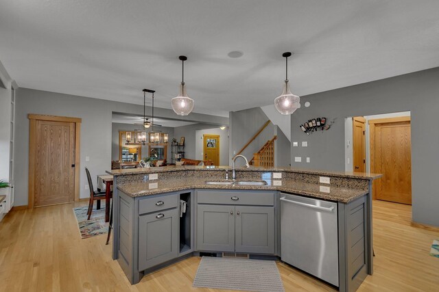 912 21st Ave N, Sartell, MN 56377 - kitchen featuring a sink, gray cabinets, stainless steel dishwasher, and light wood-style flooring