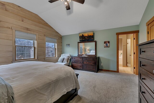 912 21st Ave N, Sartell, MN 56377 - bedroom with wooden walls, light colored carpet, a ceiling fan, baseboards, and vaulted ceiling