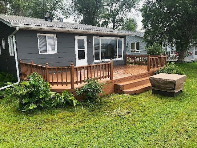 50435 Angle Rd, Pelican Rapids, MN 56572 - back of house with a yard and a wooden deck