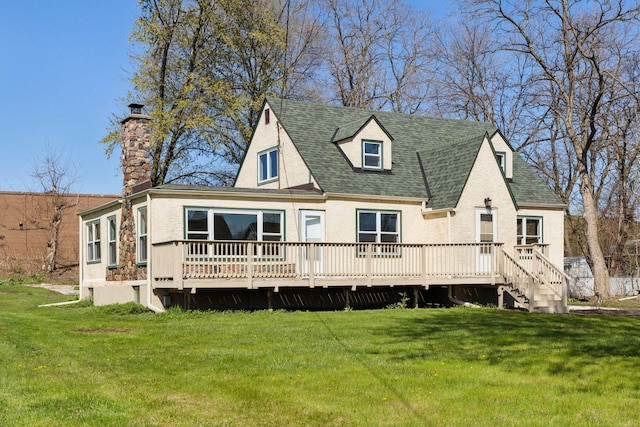 2979 Centerville Rd, Little Canada, MN 55117 - back of house featuring a lawn, a wooden deck, and a chimney
