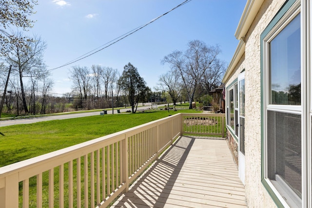 2979 Centerville Rd, Little Canada, MN 55117 - wooden terrace featuring a yard