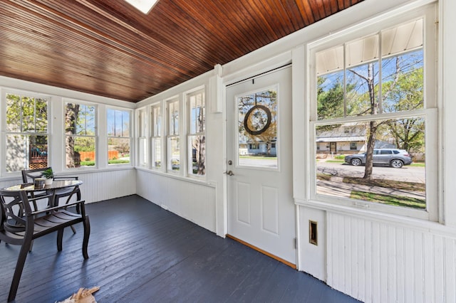 sunroom / solarium with wood ceiling and hardwood / wood-style floors