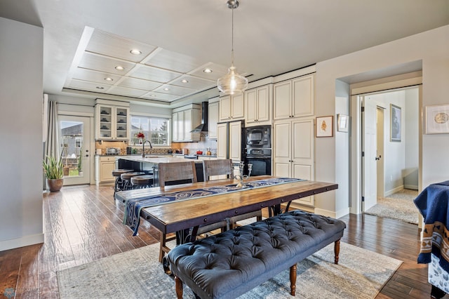 6028 Silverleaf Dr S, Fargo, ND 58104 - dining area featuring baseboards, recessed lighting, and dark wood finished floors
