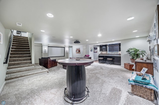 6028 Silverleaf Dr S, Fargo, ND 58104 - recreation room featuring carpet floors, bar, recessed lighting, and visible vents