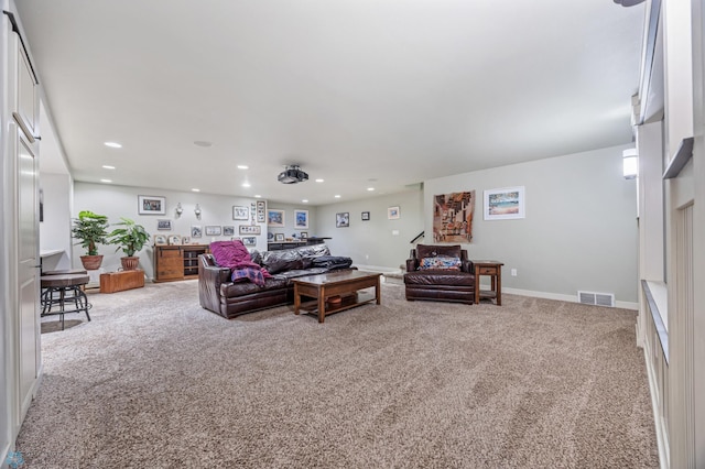 6028 Silverleaf Dr S, Fargo, ND 58104 - living area featuring baseboards, carpet flooring, recessed lighting, and visible vents