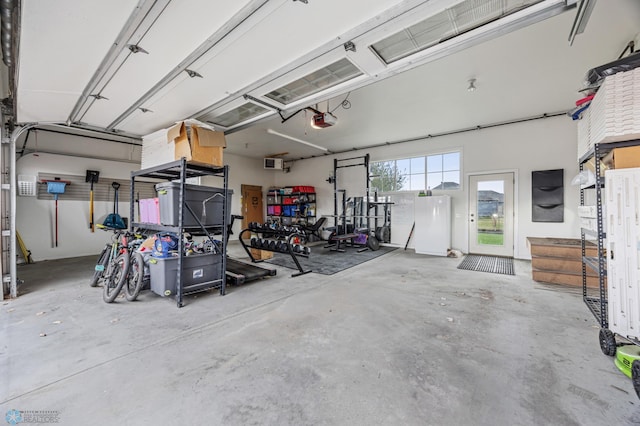 6028 Silverleaf Dr S, Fargo, ND 58104 - garage featuring a garage door opener