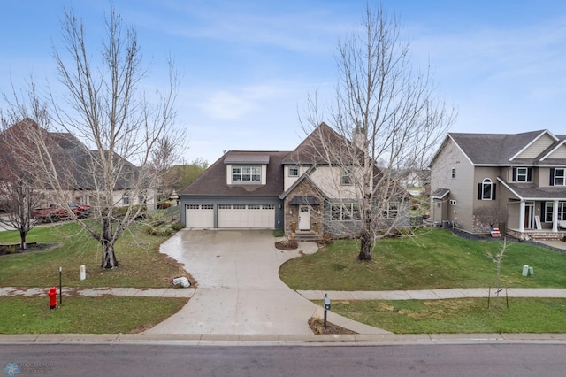 6028 Silverleaf Dr S, Fargo, ND 58104 - view of front facade featuring a chimney, a garage, a front lawn, concrete driveway, and stone siding