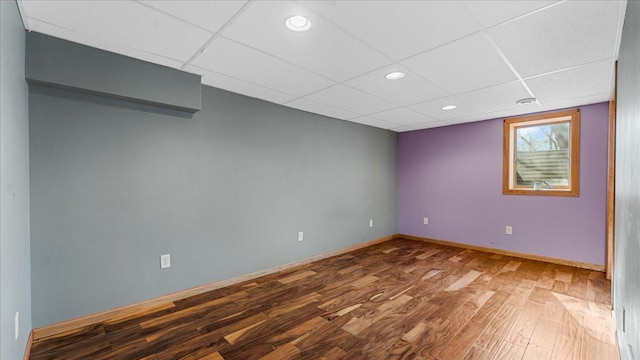 21151 150th St, Sauk Centre, MN 56378 - unfurnished room featuring a paneled ceiling, wood finished floors, baseboards, and recessed lighting