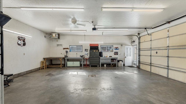 21151 150th St, Sauk Centre, MN 56378 - garage featuring a garage door opener and baseboards
