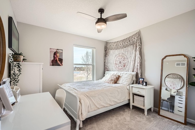 13665 Marsh View Trl, Rogers, MN 55374 - bedroom with baseboards, light carpet, a ceiling fan, and visible vents