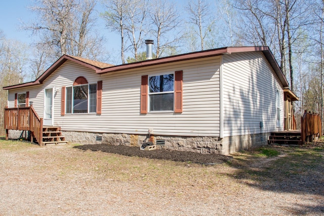 4684 Lower Ten Mile Lake Rd NW, Hackensack, MN 56452 - view of side of home with crawl space and a wooden deck