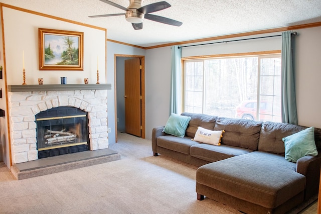 4684 Lower Ten Mile Lake Rd NW, Hackensack, MN 56452 - carpeted living area featuring crown molding, ceiling fan, a stone fireplace, and a textured ceiling